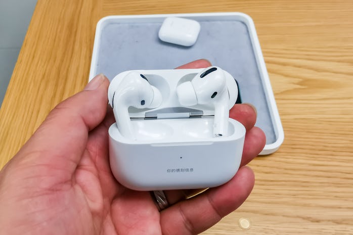 A man shows AirPods Pro at an Apple store on East Nanjing Road on October 30, 2019 in Shanghai, Chin...