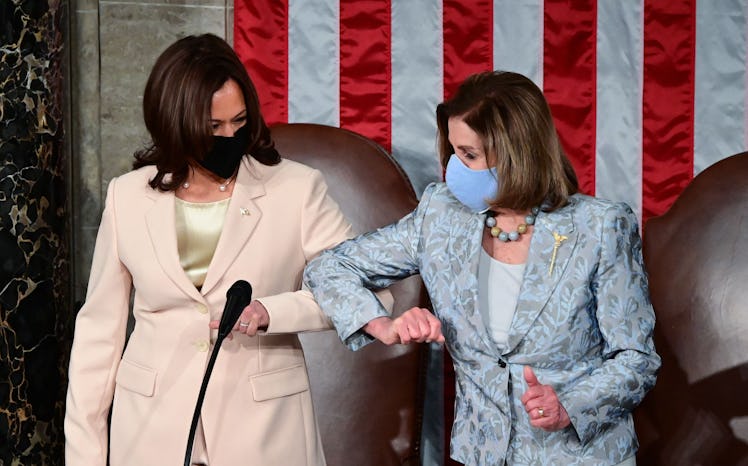 US Vice President Kamala Harris (L) greets Speaker of the US House of Representatives Nancy Pelosi, ...
