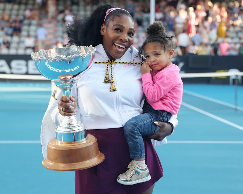 Serena Williams of the US with her daughter Alexis Olympia after her win against Jessica Pegula of t...