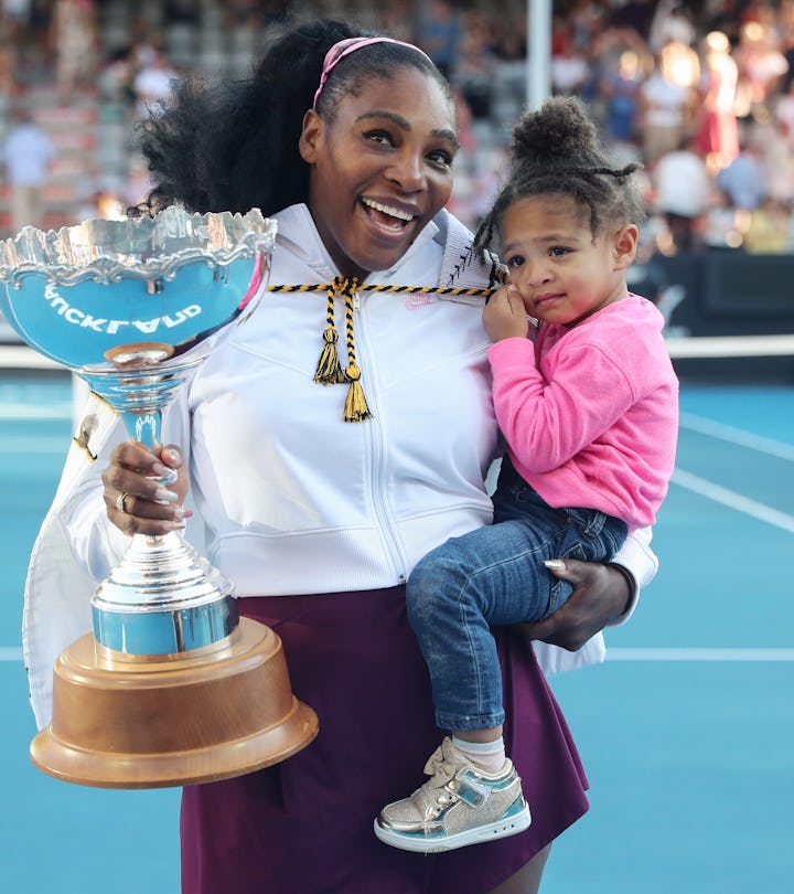 Serena Williams of the US with her daughter Alexis Olympia after her win against Jessica Pegula of t...