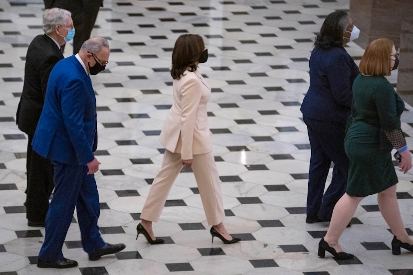 WASHINGTON, DC - APRIL 28:  U.S. Vice President Kamala Harris followed by Senate Majority Leader Chu...