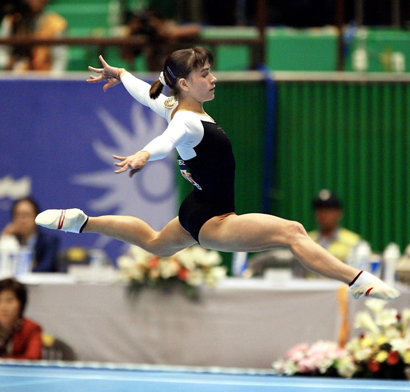 Oksana Chusovitina of Uzbekistan performs on the floor during the women's apparatus finals for the 1...