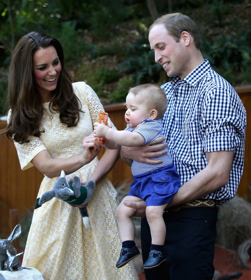 Prince William and Kate Middleton with Prince George in 2014.