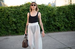 BERLIN, GERMANY - JULY 04: Ema Etoile is seen attending Danny Reinke wearing black bodysuit with wh...