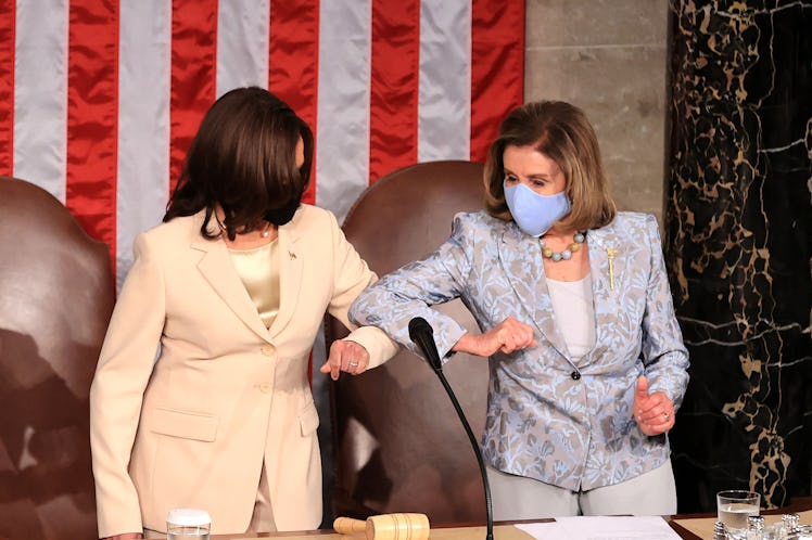 US Vice President Kamala Harris (L) greets House Speaker Nancy Pelosi (D-CA) ahead of US President J...