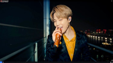 UNSPECIFIED: In this screengrab released on March 14, Jimin of music group BTS performs onstage duri...