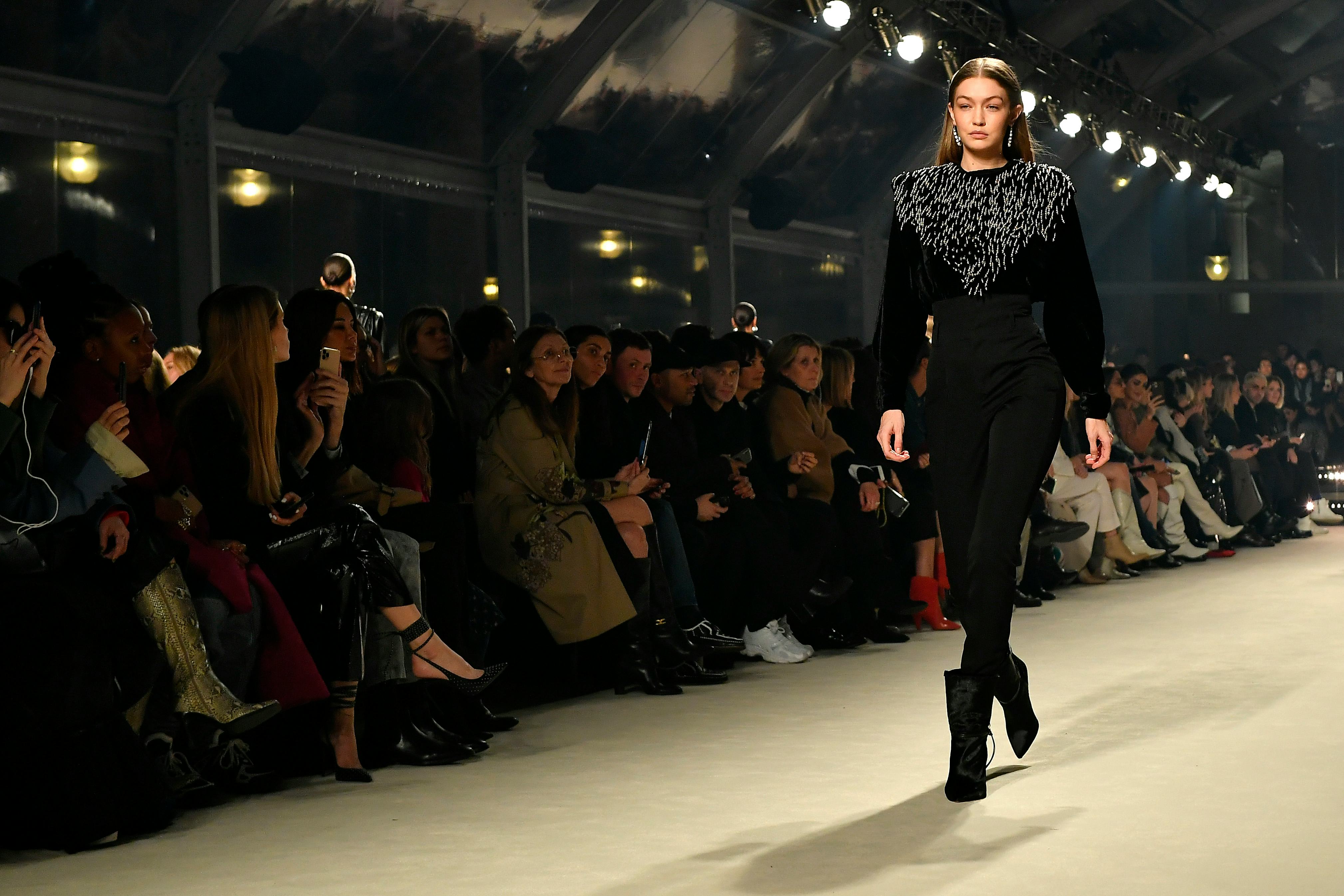 PARIS, FRANCE - FEBRUARY 27: (EDITORIAL USE ONLY) Gigi Hadid walks the runway during the Isabel Mara...