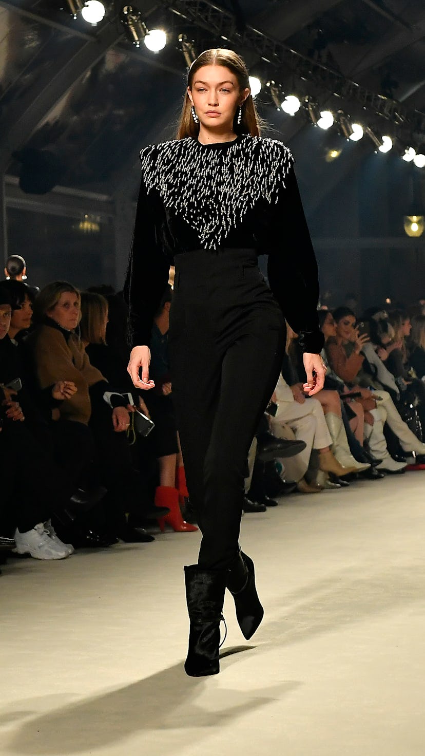 PARIS, FRANCE - FEBRUARY 27: (EDITORIAL USE ONLY) Gigi Hadid walks the runway during the Isabel Mara...