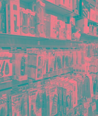 Horizontal color image of a sex shop with various products on the walls in London, United Kingdom. T...