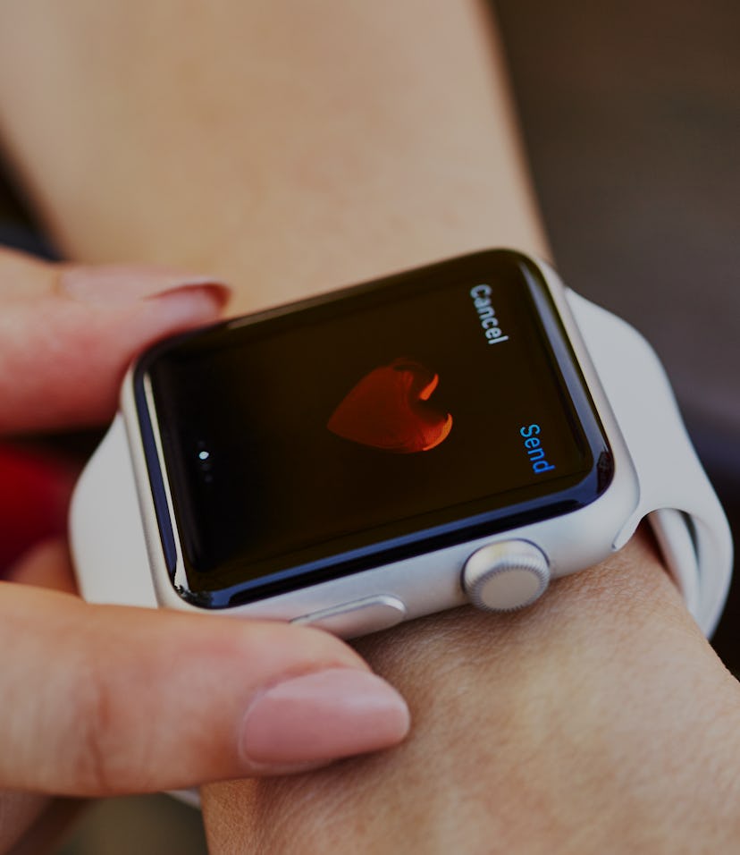 Istanbul, Turkey - September 6, 2015: A woman wearing 42mm stainless steel Apple Watch with white sp...