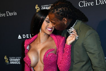 US rapper Cardi B (L) and boyfriend Offset arrive for the Recording Academy and Clive Davis pre-Gram...