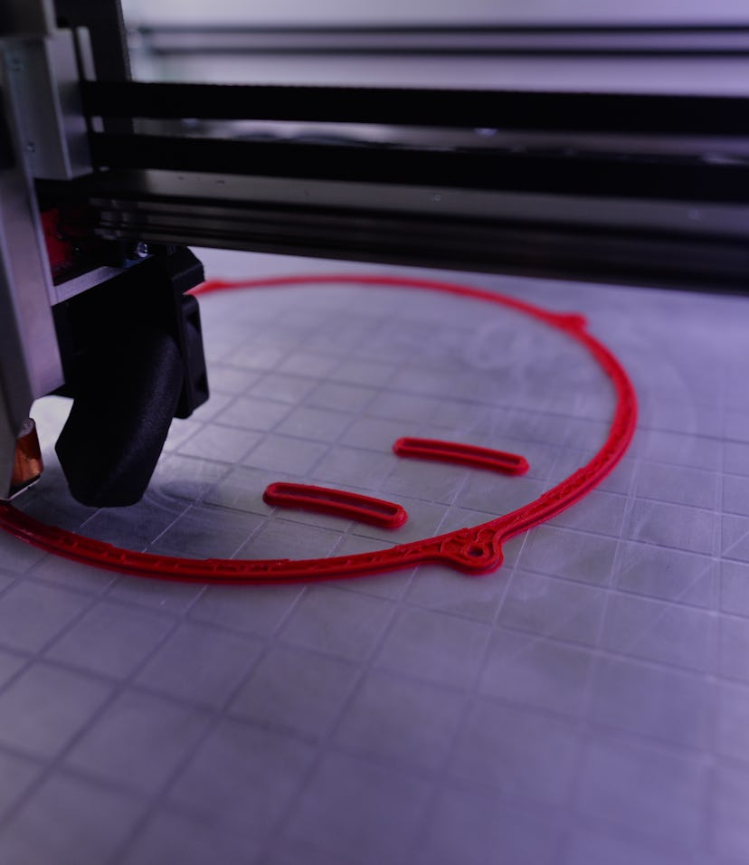 A 3D printer makes partes of the VentilAid Prototype III respirator, a device that can be manufactur...