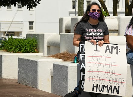 MONTGOMERY, AL - MARCH 30: Opponents of several bills targeting transgender youth attend a rally at ...