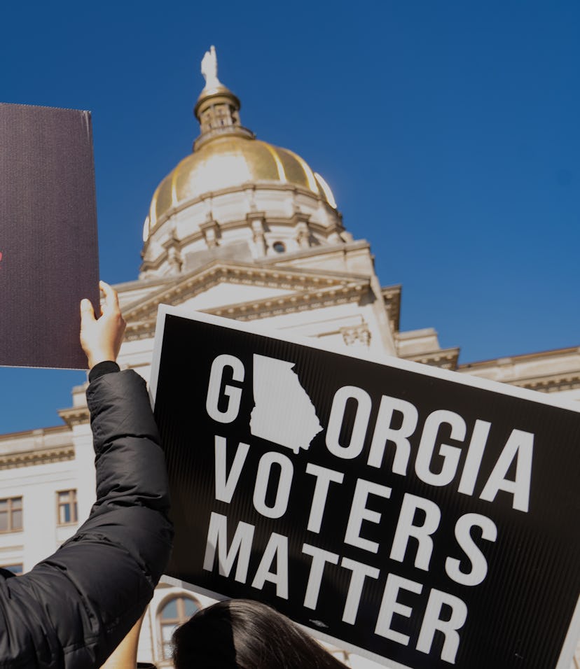 ATLANTA, GA - MARCH 03: Demonstrators stand outside of the Georgia Capitol building, to oppose the H...