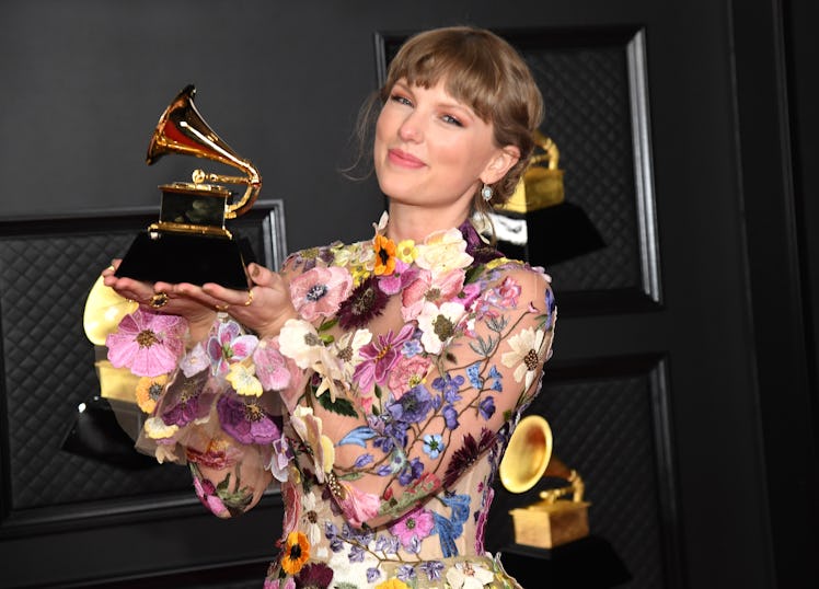 LOS ANGELES, CALIFORNIA - MARCH 14: Taylor Swift, winner of Album of the Year for 'Folklore', poses ...