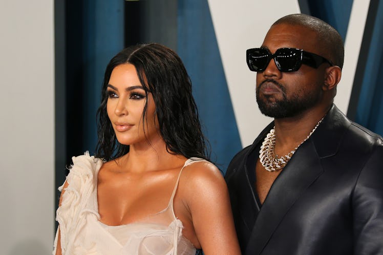 US media personality Kim Kardashian (L) and husband US rapper Kanye West attend the 2020 Vanity Fair...
