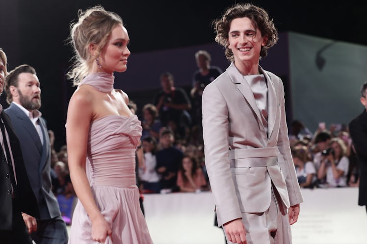 VENICE, ITALY - SEPTEMBER 02: Lily-Rose Depp and Timothee Chalamet attend "The King" red carpet dur...
