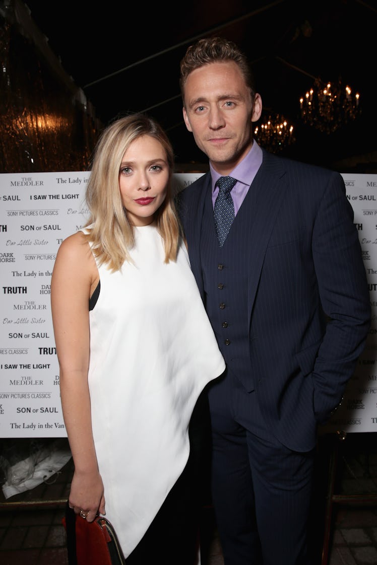 TORONTO, ON - SEPTEMBER 12: Actors Tom Hiddleston (L) and Elizabeth Olsen attend the SPC Toronto Par...