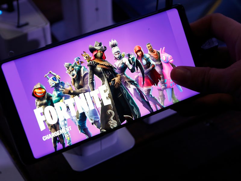 PARIS, FRANCE - OCTOBER 26: A gamer plays the video game 'Fortnite Battle Royale' developed by Epic...