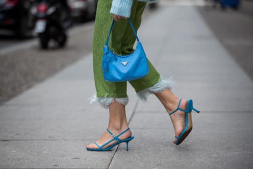 BERLIN, GERMANY - MAY 19: Sonia Lyson is seen wearing blue sandels Ducie, green cropped pants Milk W...