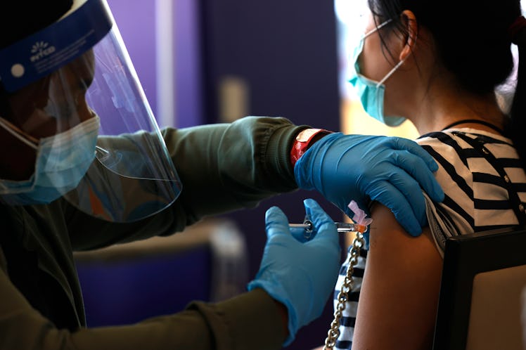 SANTA CLARA, CALIFORNIA - APRIL 08: A nurse administers a COVID-19 vaccination during a vaccination ...