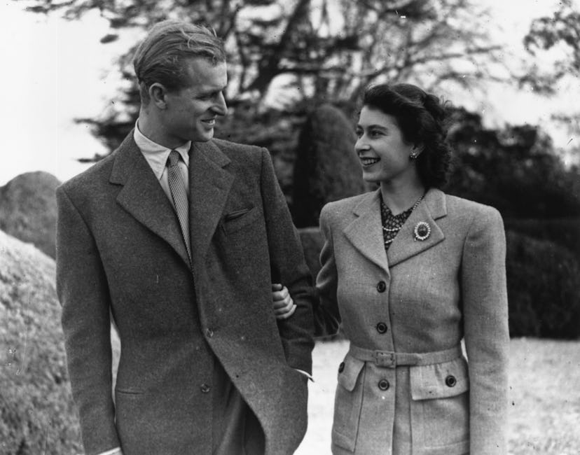 24th November 1947:  Princess Elizabeth and The Prince Philip, Duke of Edinburgh enjoying a walk dur...