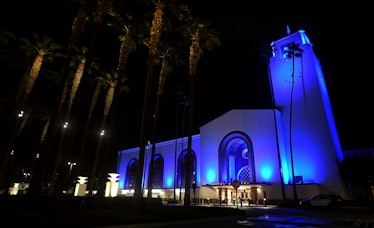 LOS ANGELES, CA - APRIL 16:   Union Station is lit up blue along with more than 100 major sporting a...