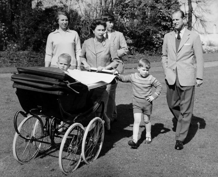 *Scanned low-res from print, high-res available on request* Baby Prince Edward with his parents, Que...