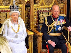 LONDON, ENGLAND - JUNE 04:  Queen Elizabeth II sits with Prince Philip, Duke of Edinburgh as she del...