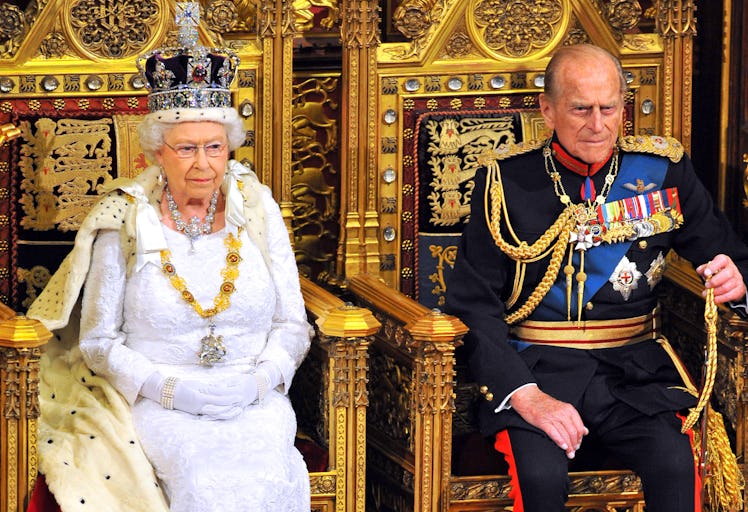 LONDON, ENGLAND - JUNE 04:  Queen Elizabeth II sits with Prince Philip, Duke of Edinburgh as she del...