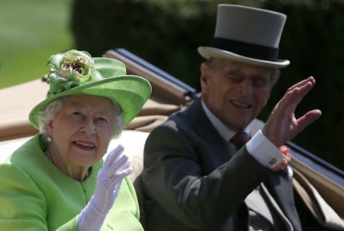 Britain's Queen Elizabeth II and her husband Britain's Prince Philip, Duke of Edinburgh travel by ho...