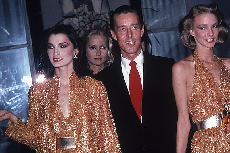 Halston (1932 - 1990) and the Halstonettes at a perfume launch held at Saks 5th Ave., New York, ca.1...