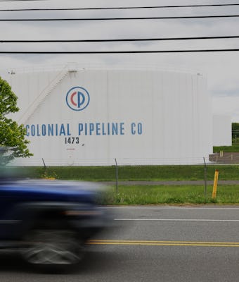 WOODBRIDGE, NEW JERSEY - MAY 10: Fuel holding tanks are seen at Colonial Pipeline's Linden Junction ...