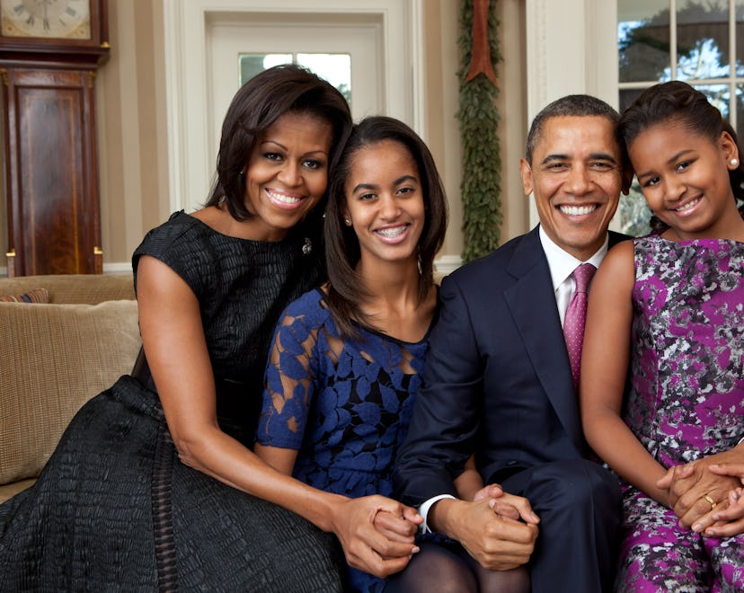 In this handout provided by the White House, (L - R) First Lady Michelle Obama, Malia Obama, U.S. Pr...