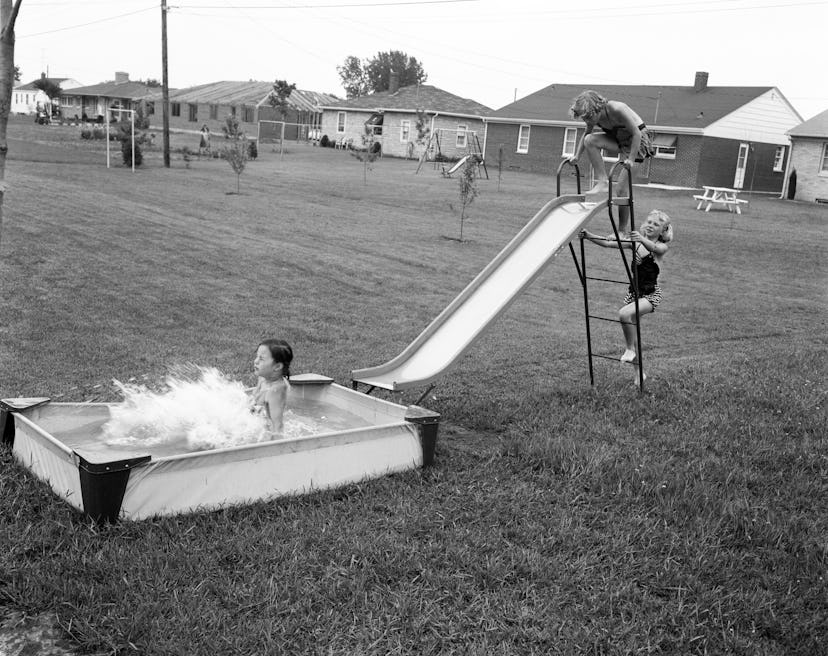 A homemade slip and slide in the 1950s.