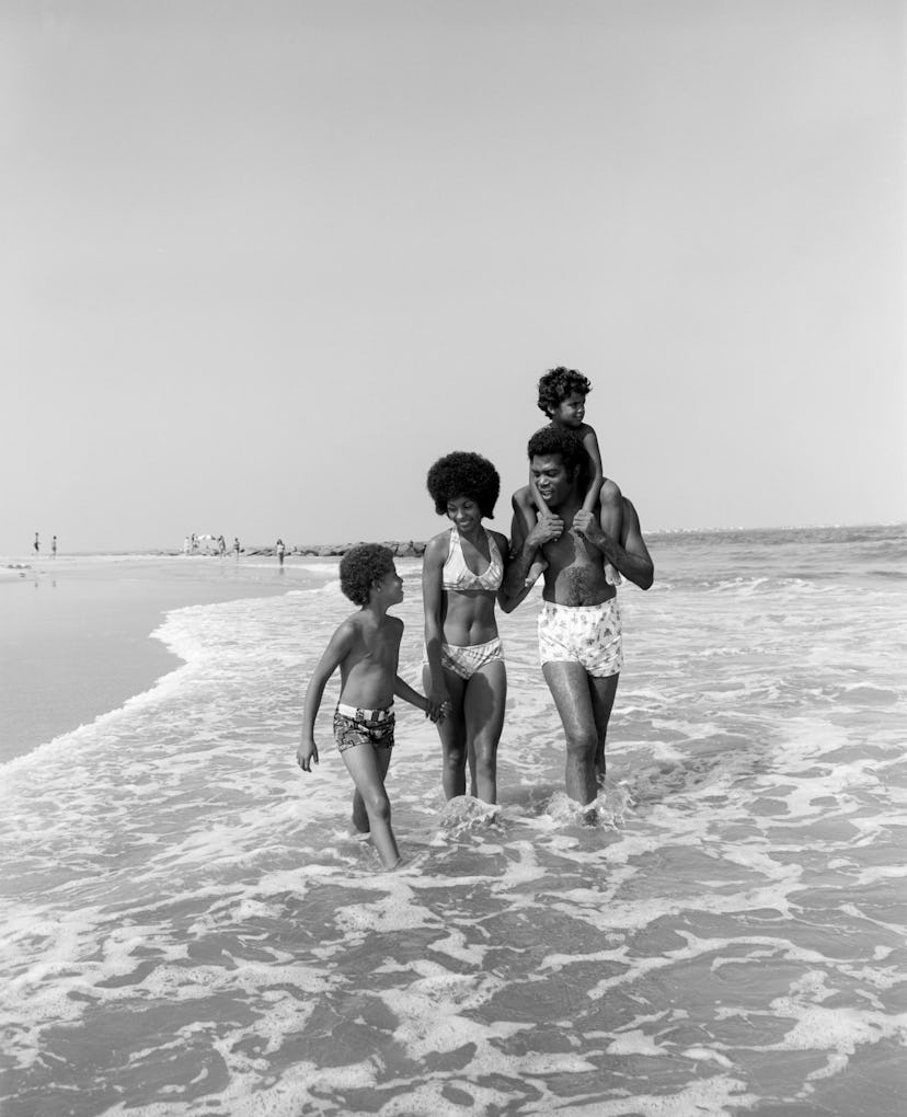 1970s family on the beach.
