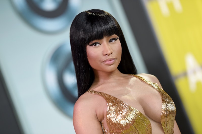 Nicki Minaj wore pink Crocs and nothing else, and bedazzled them with a Chanel logo.