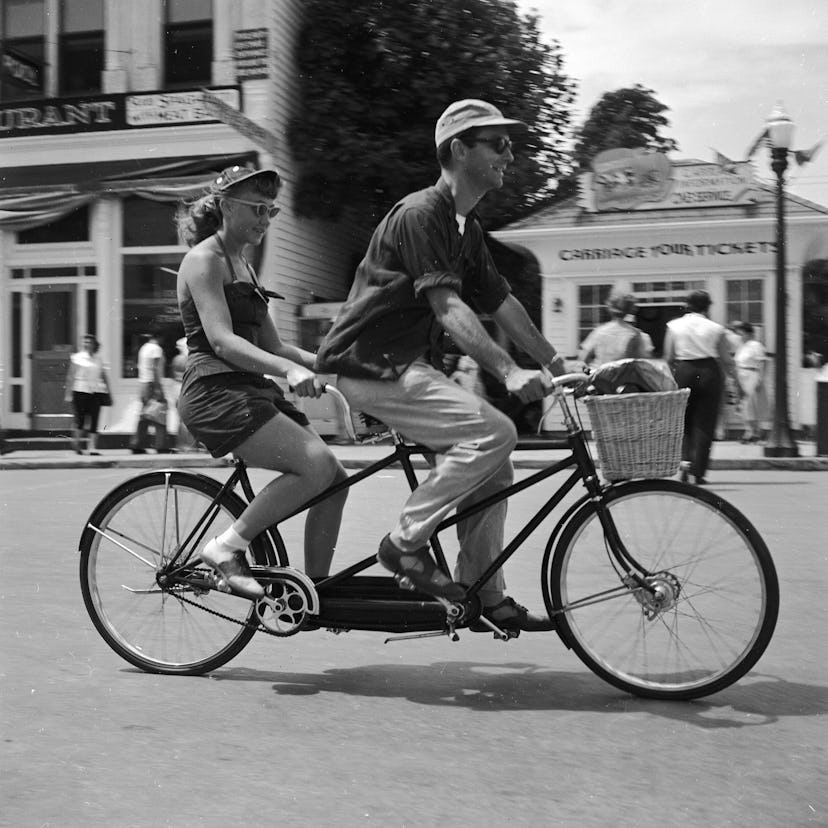 A tandem bicycle in 1955 is perfect.