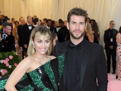 NEW YORK, NEW YORK - MAY 06: Miley Cyrus and Liam Hemsworth arrive for the 2019 Met Gala celebrating...