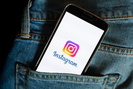 POLAND - 2021/03/22: In this photo illustration, an Instagram logo seen displayed on a smartphone. (...