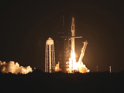 TOPSHOT - A SpaceX Falcon 9 rocket, carrying the Crew-2 mission astronauts, lifts off from launch co...