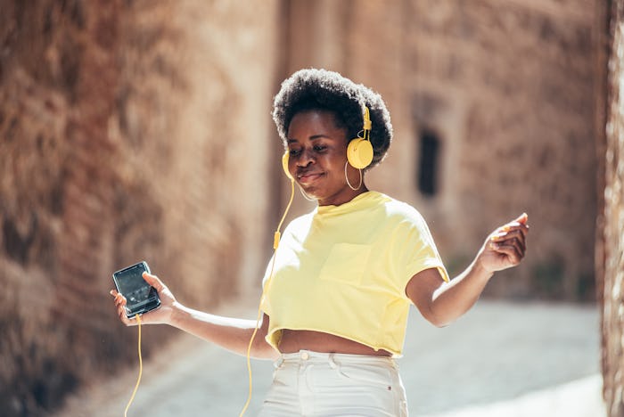 tween girl listening to headphones