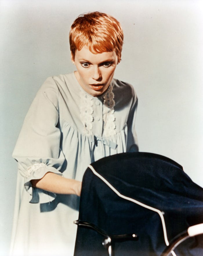 Mia Farrow looks into a carriage in publicity portrait for the film 'Rosemary's Baby', 1968. (Photo ...