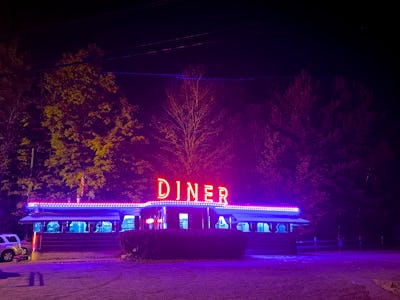 Illuminated signage and lighting at night at Martindale Chief Diner, Craryville, Columbia County, Ne...