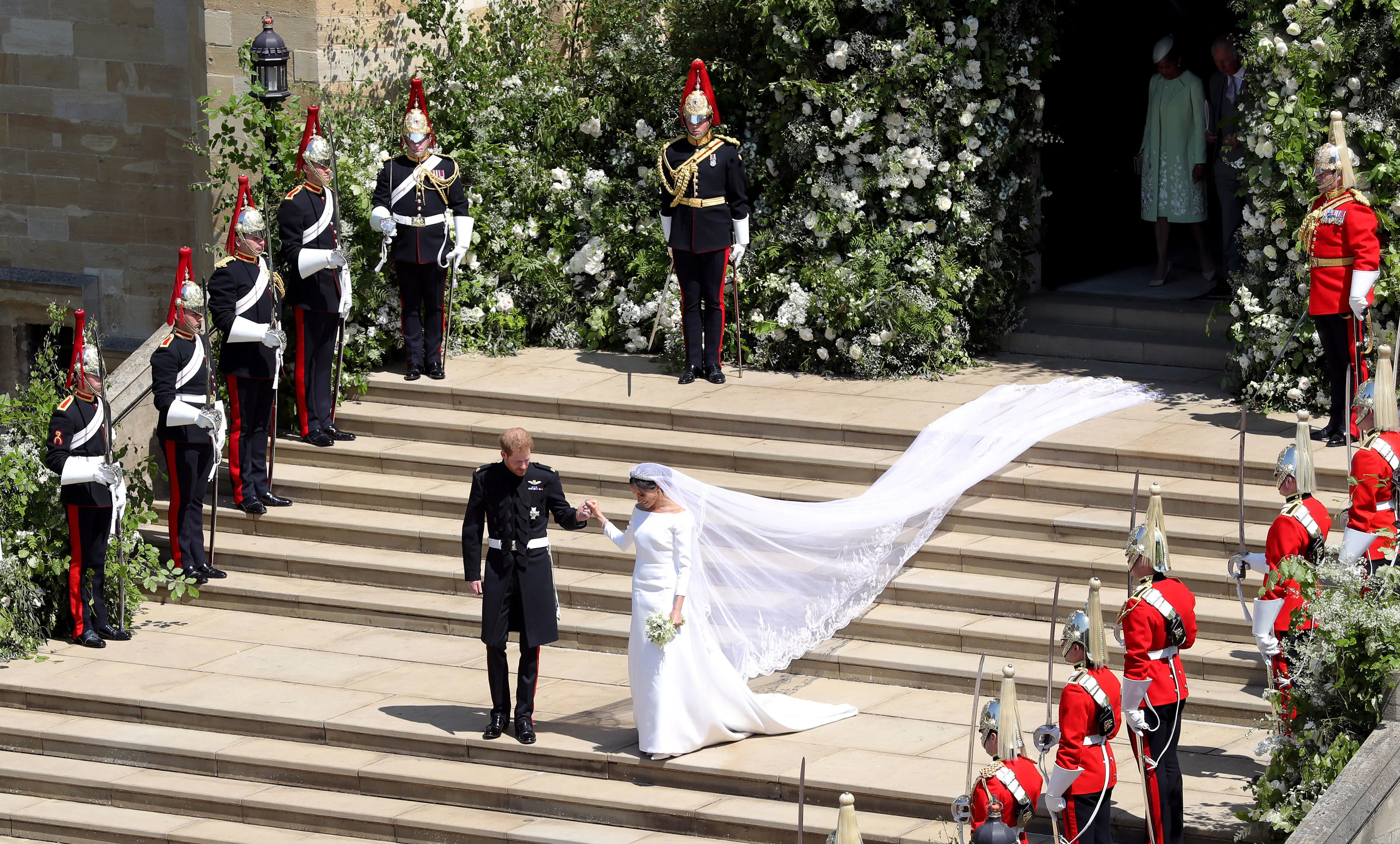 Meghan Markle's Wedding Dress: Designer, Cost, & Everything To Know Meghan Markle's Wedding Dress: Designer, Cost, & Everything To Know