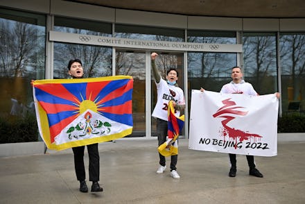 Activists of the International Tibet Network holds Tibet's flags in front of the IOC headquarters du...