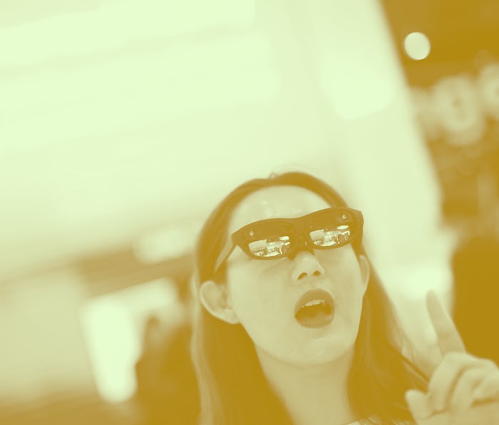 A visitor tests LG augmented reality glasses with Nreal light at the Mobile World Congress (MWC) in ...