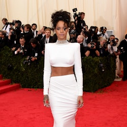 Rihanna wears a '90s-inspired white outfit at a previous Met Gala.