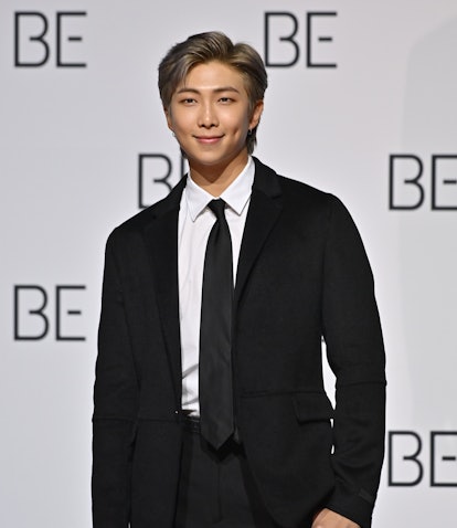 South Korean K-pop boy band BTS member RM poses for a photo session during a press conference on BTS...