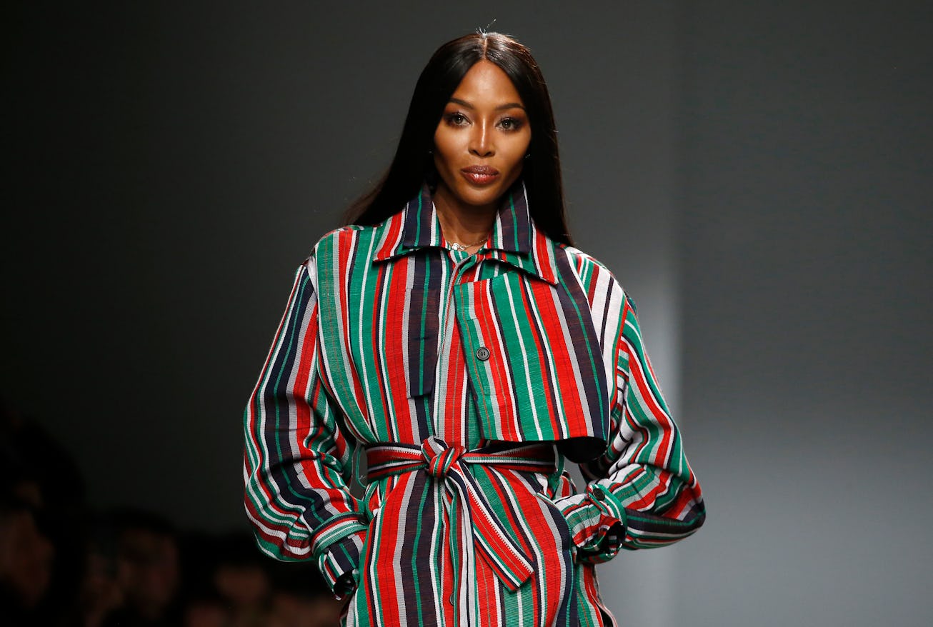 PARIS, FRANCE - FEBRUARY 24: (EDITORIAL USE ONLY) British model Naomi Campbell walks the runway duri...